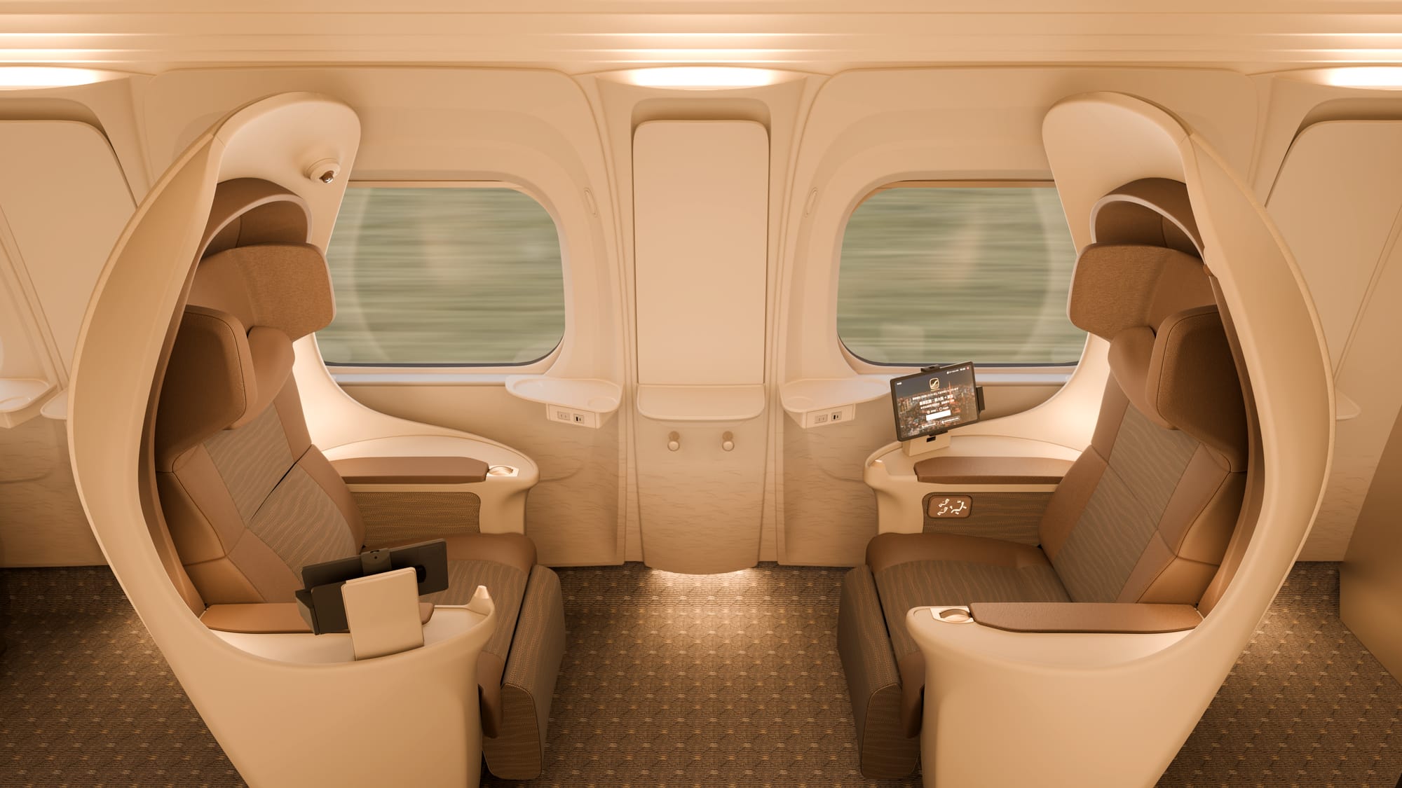 Two Supreme Class Seats turned to face each other in car 10, each a cream back-shell seat with a tablet, beneath rounded windows