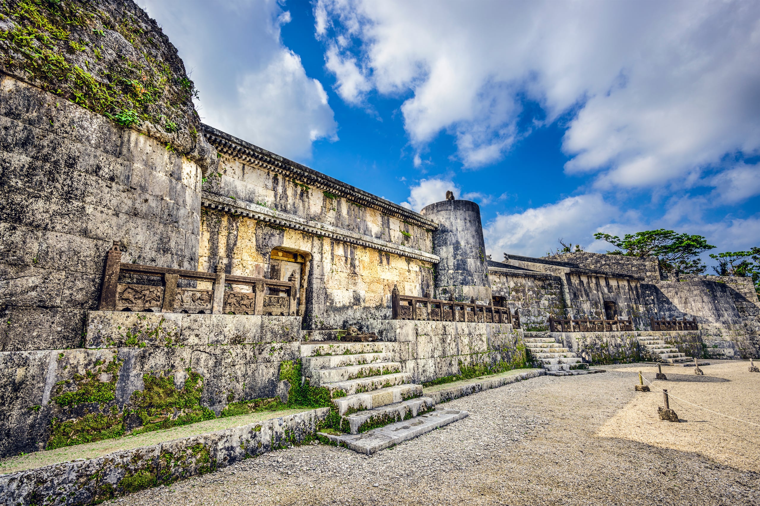 The weathered stone vaults of the Tamaudun royal mausoleum with their house-shaped roofs