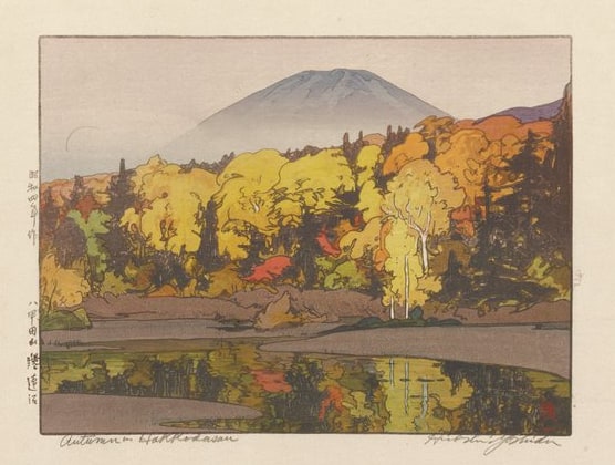 The Suiren marsh in the Hakkoda mountains of Aomori: a woodblock print by Yoshida Hiroshi of a forest in autumn colour reflected in still water below the peak